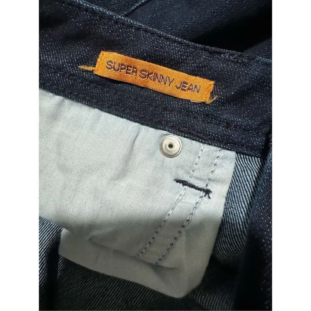 Tory Burch supper skinny jeans 30 bark blue logo on pockets back